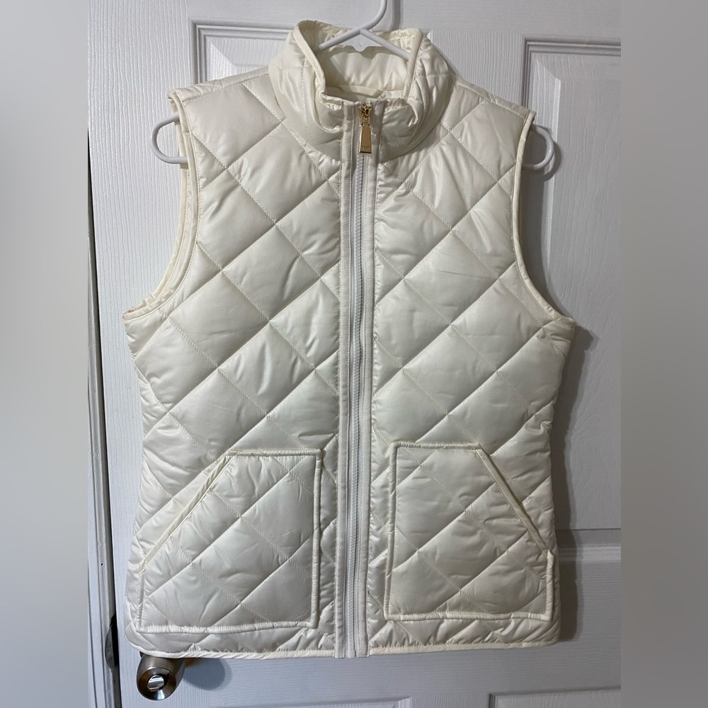 Kate Spade NWT puffer vest in a pretty cream color.  MSRP $208